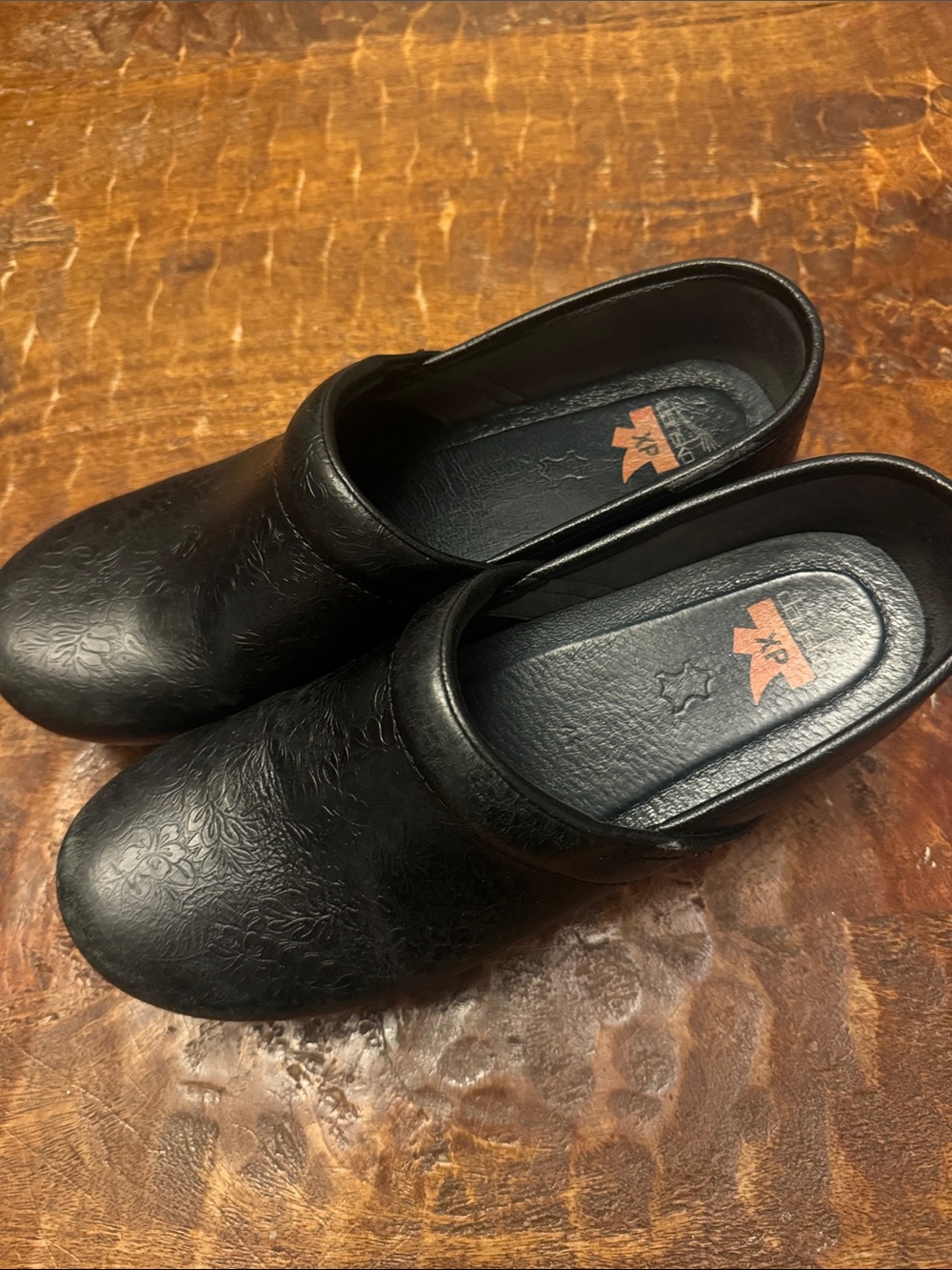 Dansko Black Embossed Leather Slip-On Clogs